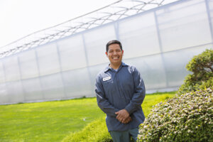 Ontario migrant farm worker inside a greenhouse