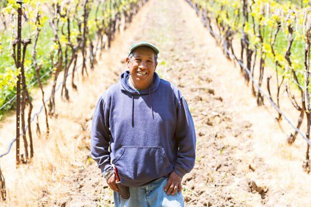 male migrant worker smiling f