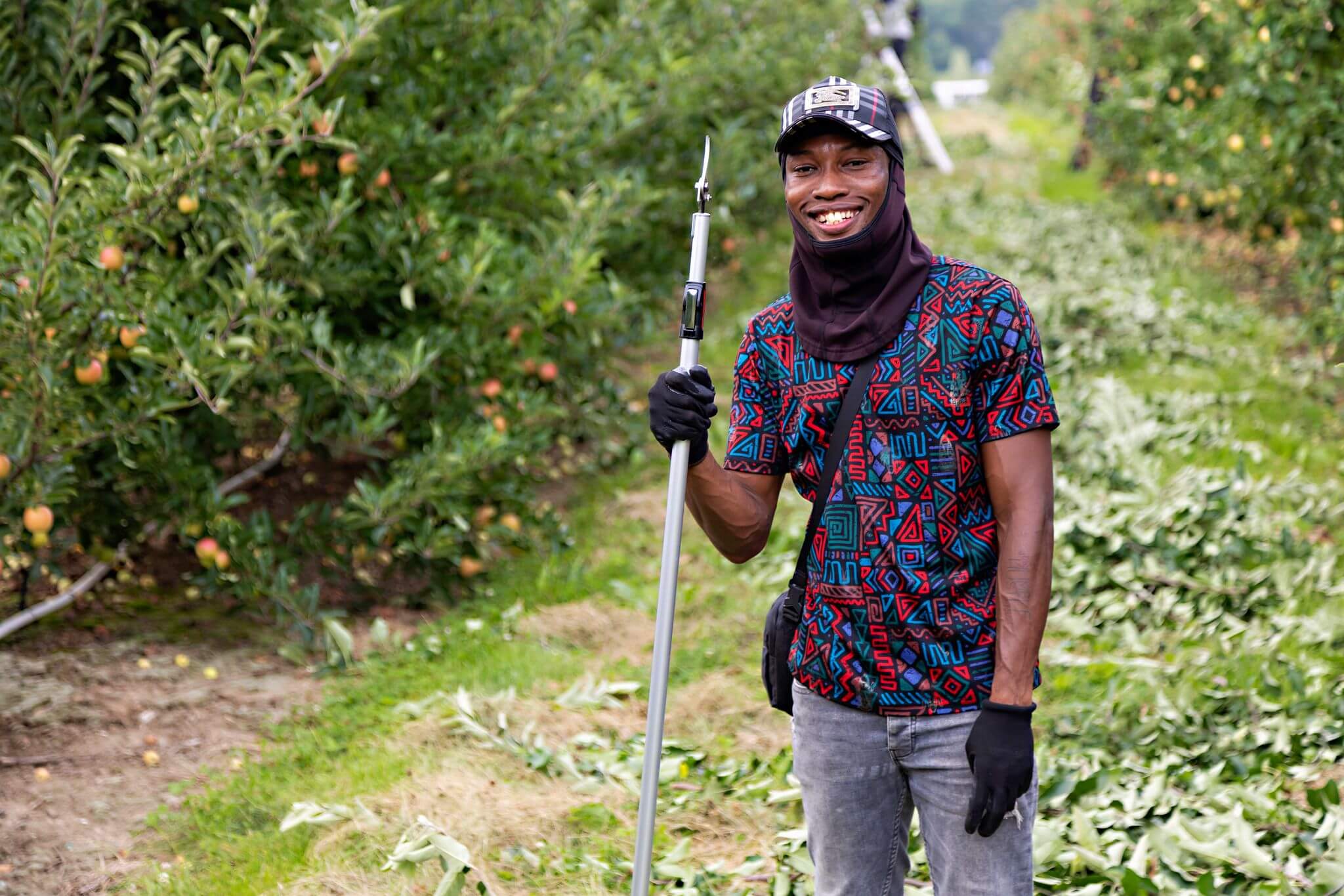 migrant farm worker posing for camera