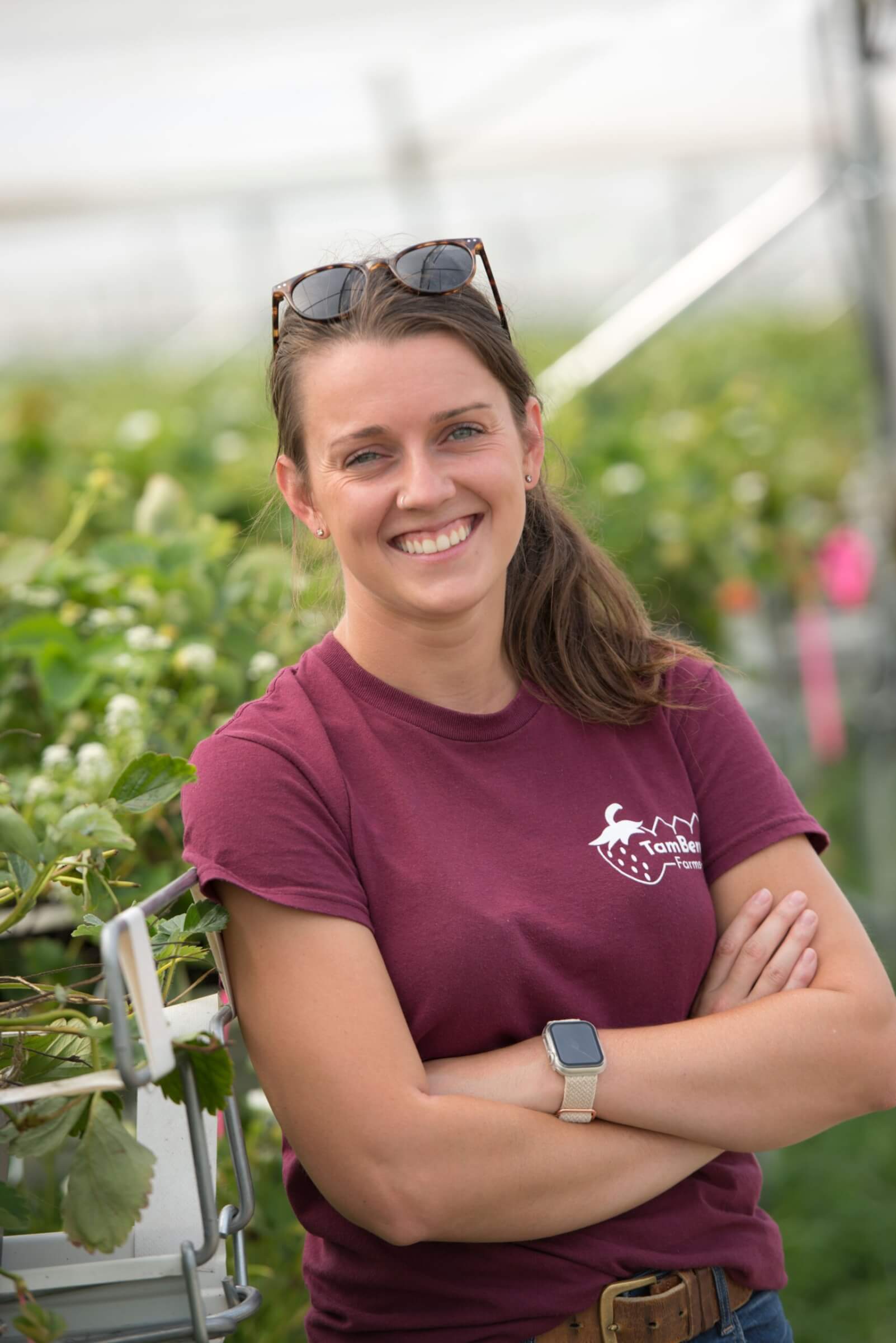 female farmer poses for camera